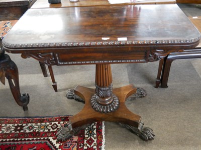Lot 461 - An early 19th Century rosewood card table, the...