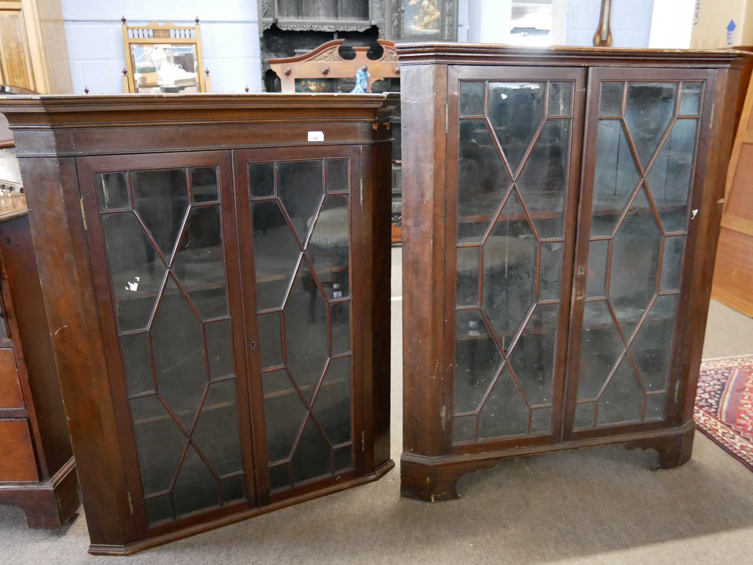 Lot 480 - Georgian mahogany two piece astragal glazed...