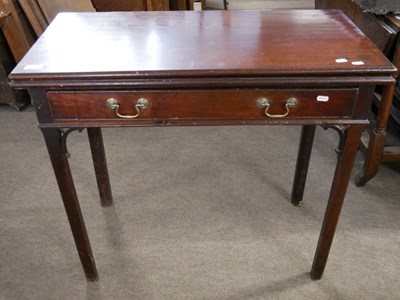 Lot 504 - Georgian mahogany tea table with folding top...