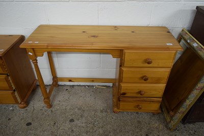 Lot 378 - MODERN PINE FOUR DRAWER DESK OR DRESSING TABLE,...