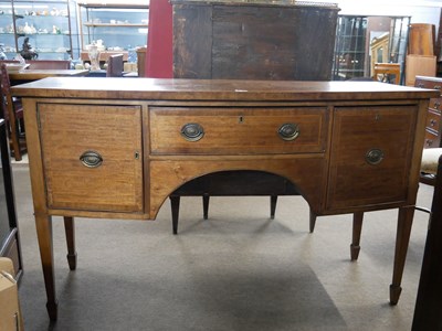 Lot 532 - An Edwardian mahogany bow front sideboard in...