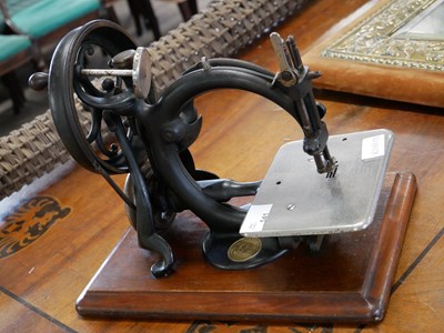 Lot 541 - Wilcox & Gibbs sewing machine, raised on a...