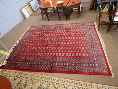 Lot 556 - Large 20th century Middle Eastern red ground...