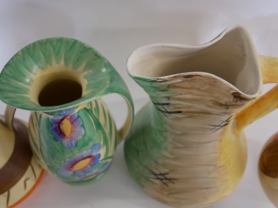 Lot 345 - Group of four Art Deco jugs, all by Myott &...