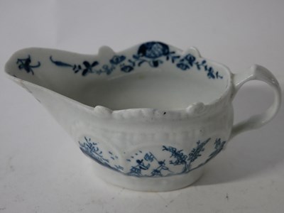 Lot 399 - Lowestoft porcelain cream jug decorated in...