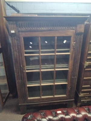 Lot 579 - 19th century oak single door cabinet with...