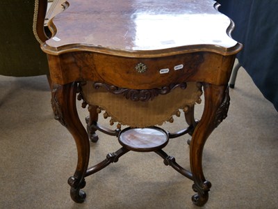 Lot 596 - Victorian walnut veneered sewing table of...