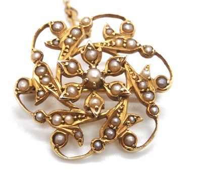 Lot 90 - An Edwardian 9ct seed pearl brooch, the...