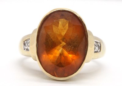 Lot 3 - A 9ct citrine ring, the oval golden citrine in...