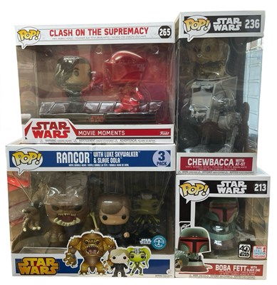 Lot 232 - A collection of large Funko Pop! vinyl figures,...