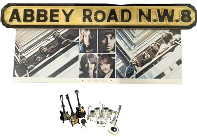 Lot 114 - A collection of Beatles display memorabilia,...