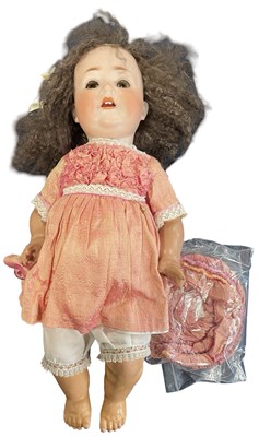 Lot 187 - A Porzellanfabrik Burggrub bisque head doll...