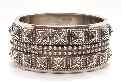 Lot 193 - A late Victorian silver bangle, the upper half...