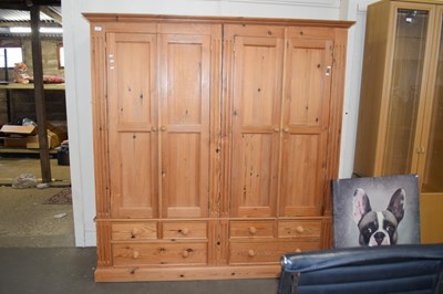 Lot 662 - Modern pine four door wardrobe with six...