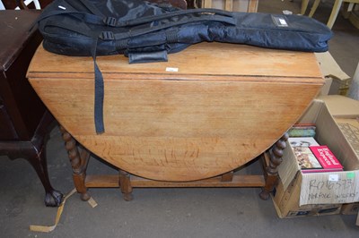 Lot 759 - Oak drop leaf dining table on barley twist legs