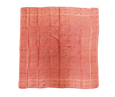 Lot 10 - A Norwich silk shawl, in red paisley pattern,...