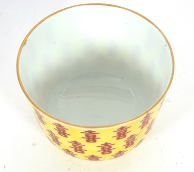 Lot 135 - A Chinese porcelain cup the yellow ground with...