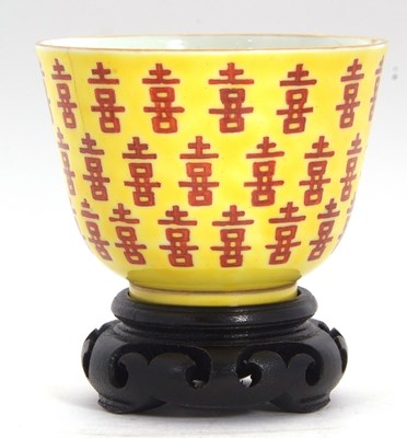 Lot 135 - A Chinese porcelain cup the yellow ground with...