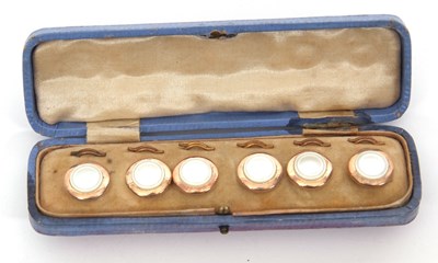 Lot 350 - A cased set of six mother-of-pearl buttons,...