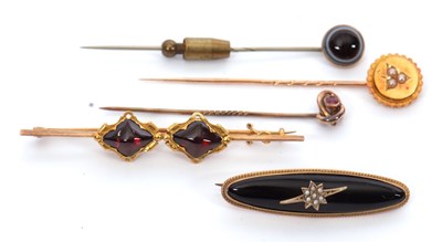 Lot 246 - A quantity of stick pins and brooches: to...