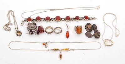 Lot 417 - A quantity of silver and amber and gemset...