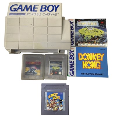 Lot 305 - A Game Boy Portable Carry-All, together with...