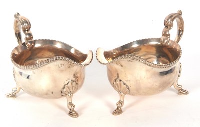 Lot 252 - A pair of George V silver sauce boats of...