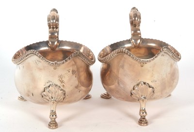 Lot 252 - A pair of George V silver sauce boats of...