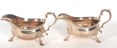 Lot 252 - A pair of George V silver sauce boats of...