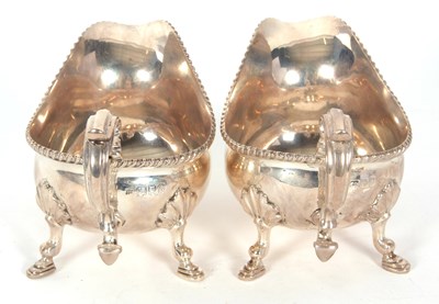 Lot 252 - A pair of George V silver sauce boats of...