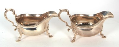 Lot 252 - A pair of George V silver sauce boats of...