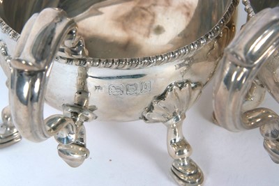 Lot 252 - A pair of George V silver sauce boats of...