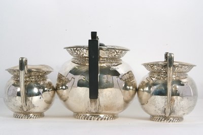 Lot 255 - A George V silver tea set of compressed oval...