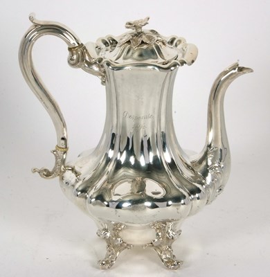 Lot 264 - A Victorian silver coffee pot of lobed...