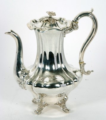 Lot 264 - A Victorian silver coffee pot of lobed...