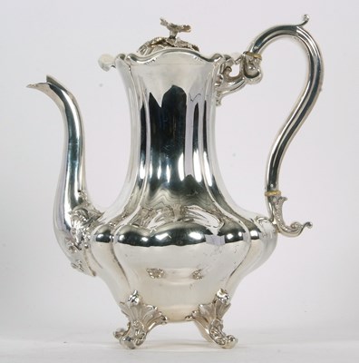 Lot 264 - A Victorian silver coffee pot of lobed...