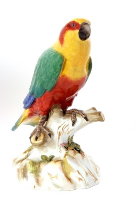 Lot 18 - A large Meissen model of a parakeet seated on...