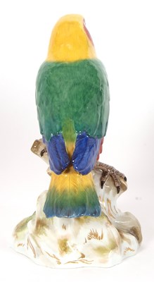 Lot 18 - A large Meissen model of a parakeet seated on...