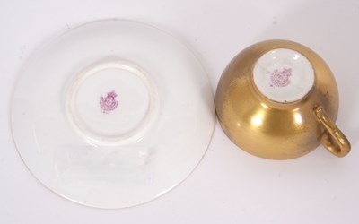 Lot 21 - A miniature Worcester porcelain cup and saucer...