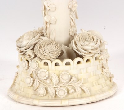 Lot 24 - A Belleek trumpet shaped vase the base with...