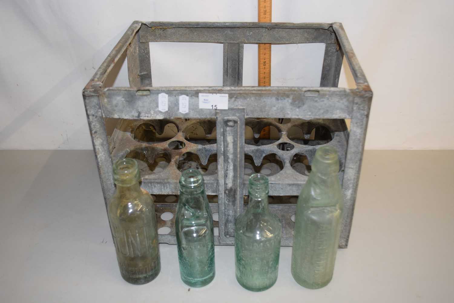 Lot 15 - Vintage metal bottle crate and contents