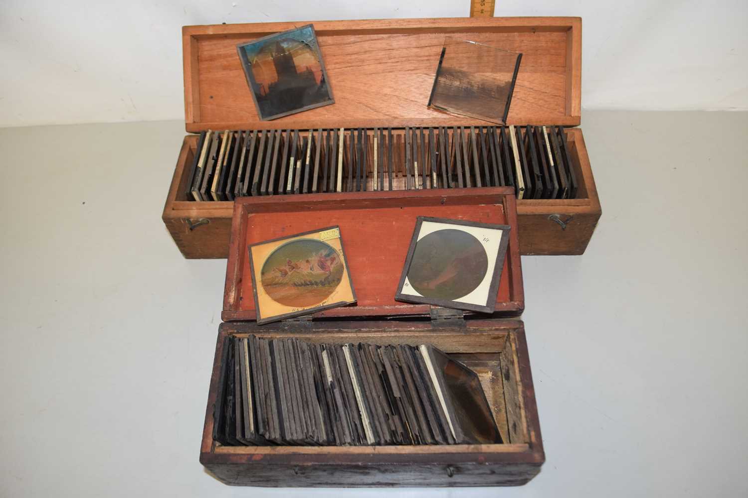 Lot 91 - Two cases of glass magic lantern slides