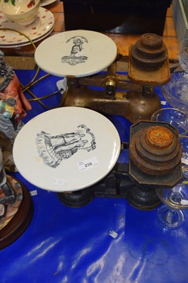 Lot 230 - Two pairs of vintage kitchen scales with weights