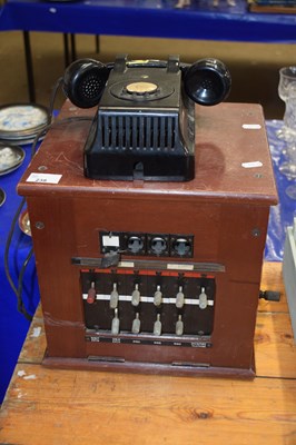 Lot 238 - A small wooden cased telephone exchange...