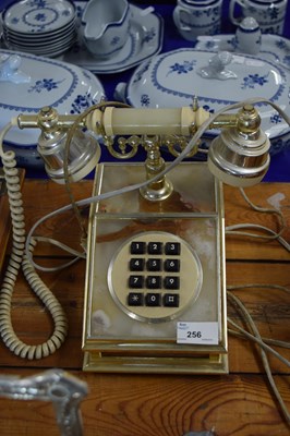 Lot 256 - A retro polished onyx effect telephone