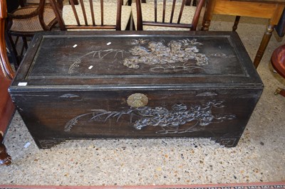 Lot 328 - Large Chinese carved camphor wood blanket box