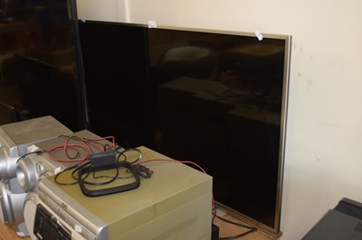 Lot 677 - A large Panasonic flat screen TV with remote