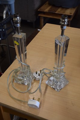 Lot 754 - A pair of perspex table lamps