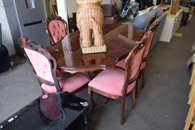 Lot 766 - A reproduction dining table and six pink...