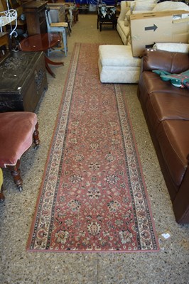 Lot 348 - Modern machine made runner carpet with floral...